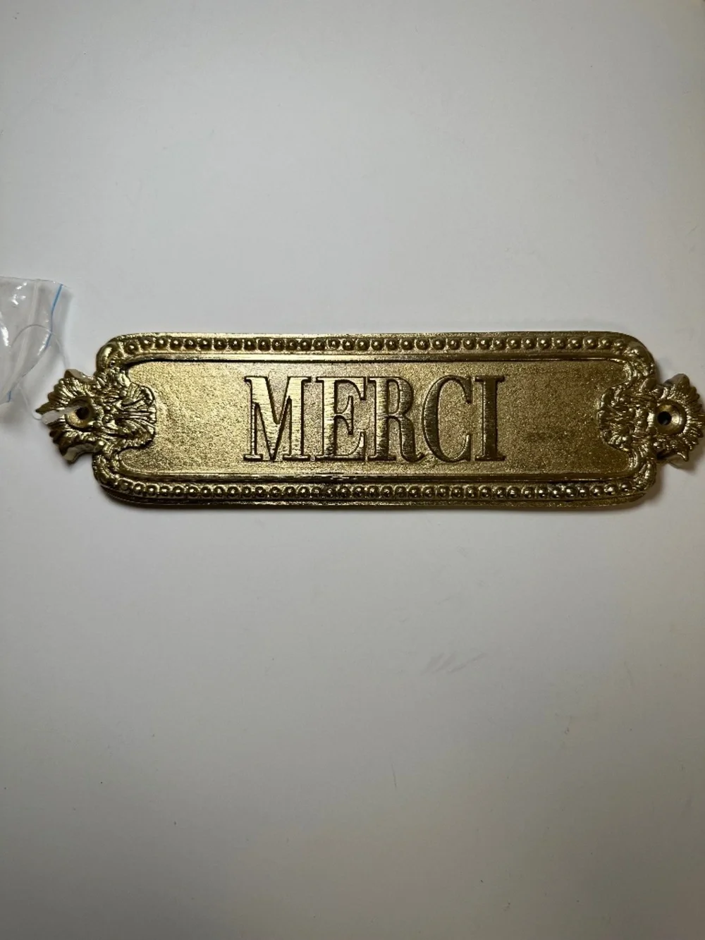 NIB French Merci Thank You Gold Metal Wall Decor Sign Plaque by Anthropologie